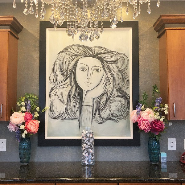 Artwork hanging on the wall