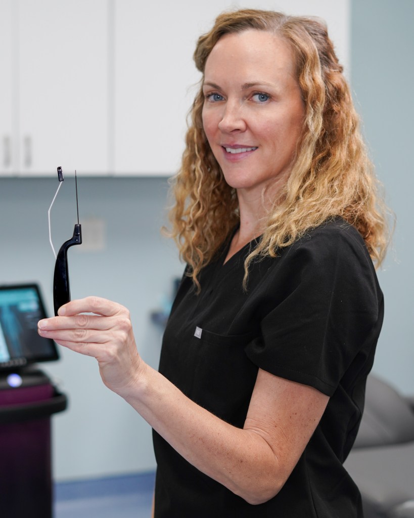 Doctor showing use of tools