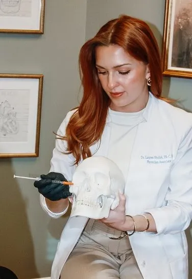 Doctor with skull demonstration